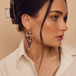 rowan leaf earrings on model