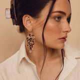 rowan leaf earrings on model