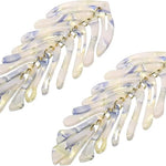 Pair of marbled hair clips on a white background