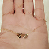Two hearts become one necklace