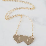 Two hearts become one necklace