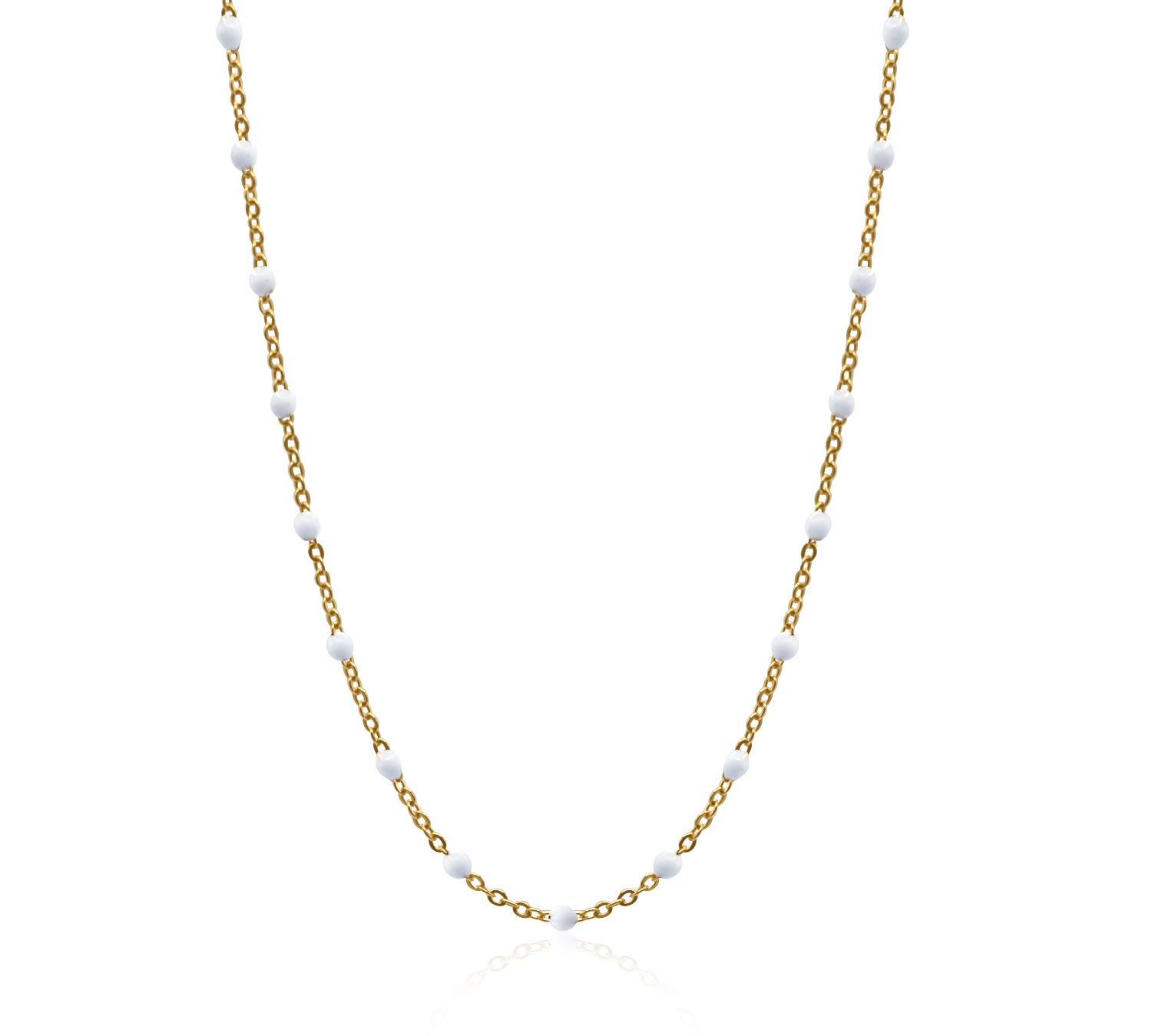 Gold chain necklace with small white beads on a white background