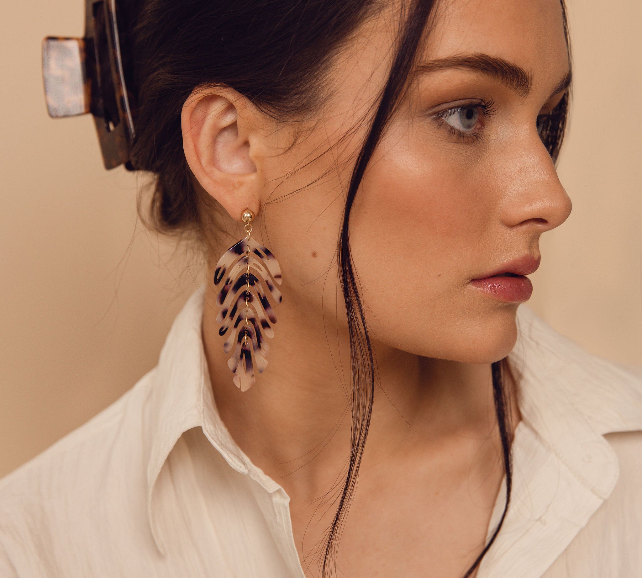 rowan leaf earrings on model