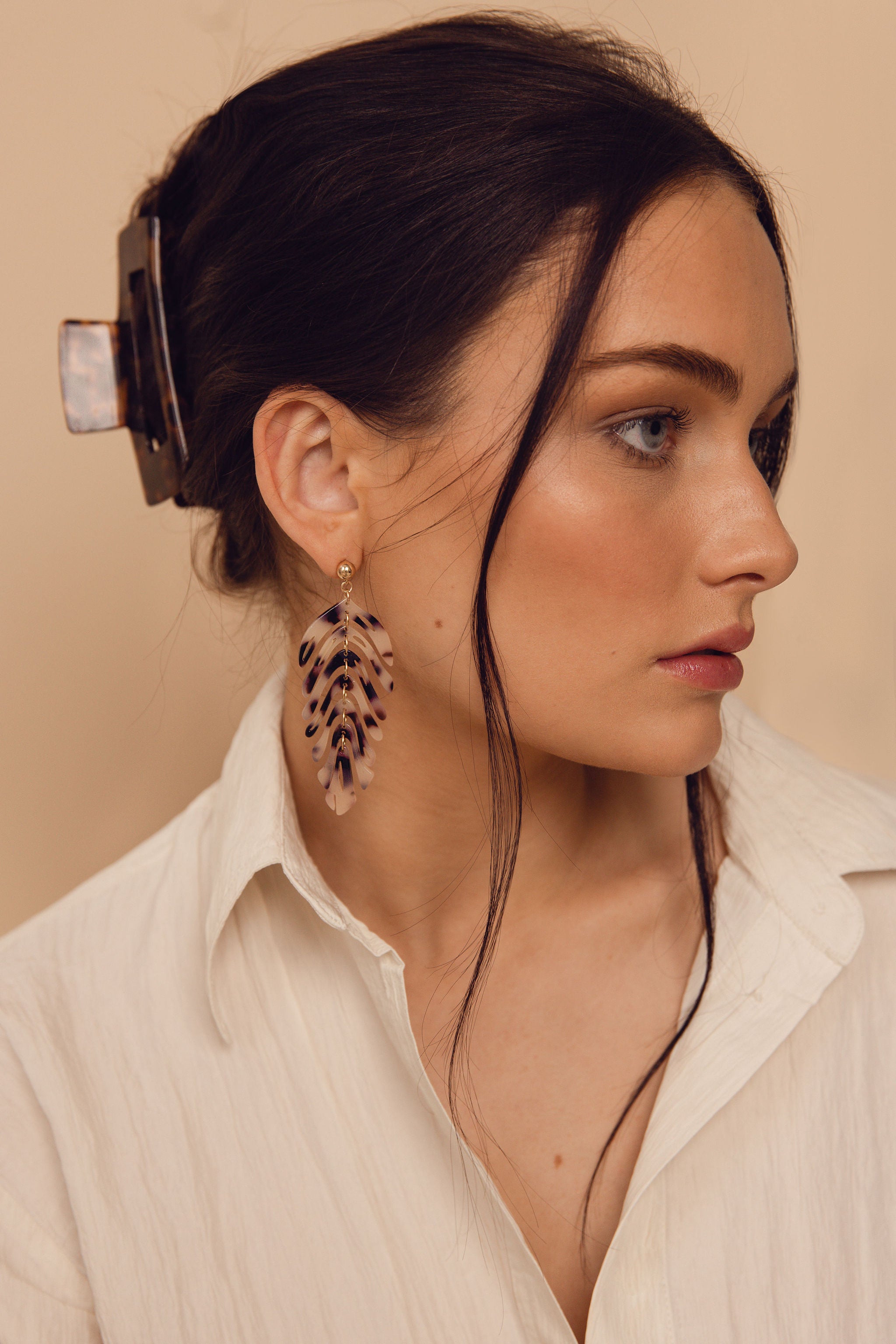 rowan leaf earrings on model